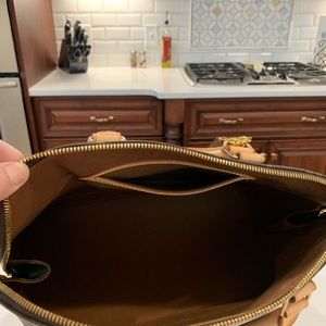 Classic monogram, authentic Louis Vuitton.